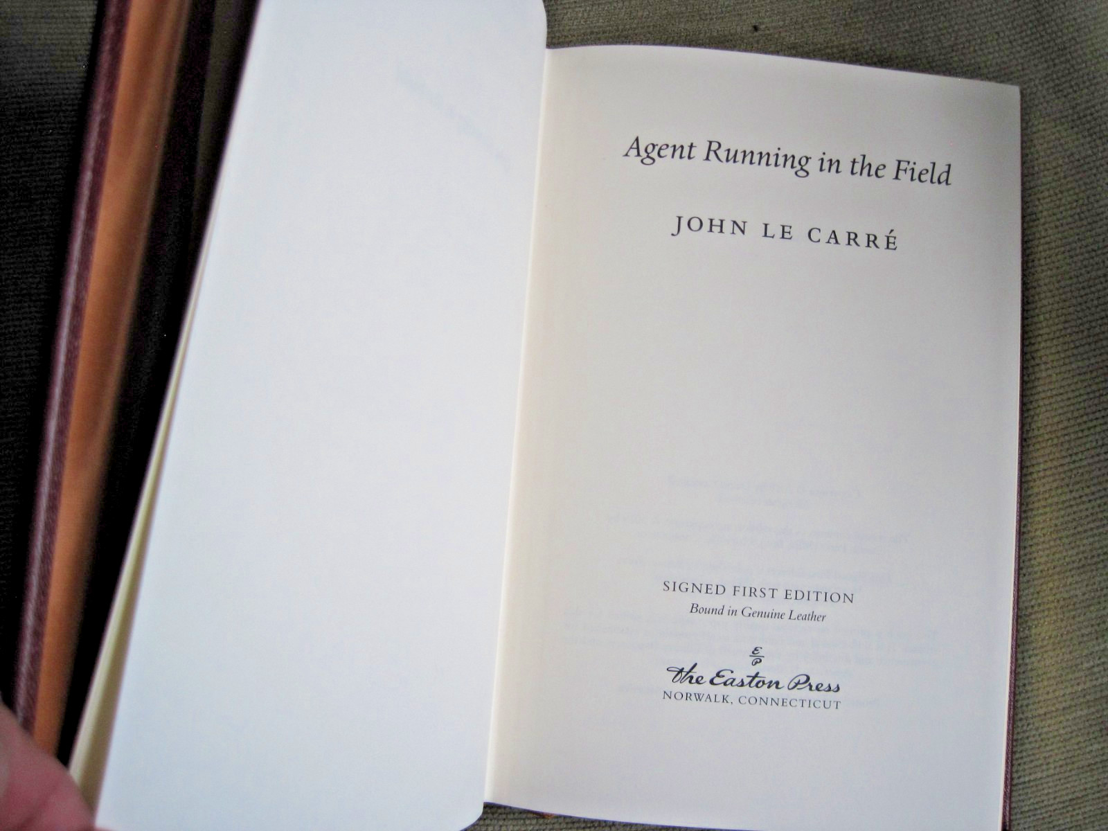JOHN LE CARRE SIGNED – AGENT RUNNING IN THE FIELD – EASTON PRESS LEATHER FIRST
