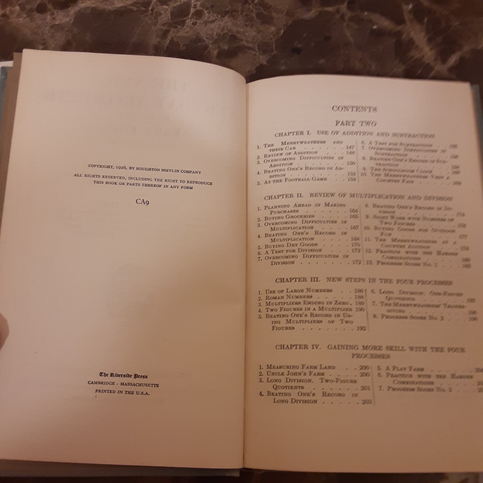 two school books copyright 1926 The new everyday arithmetic marked 3-9-1931