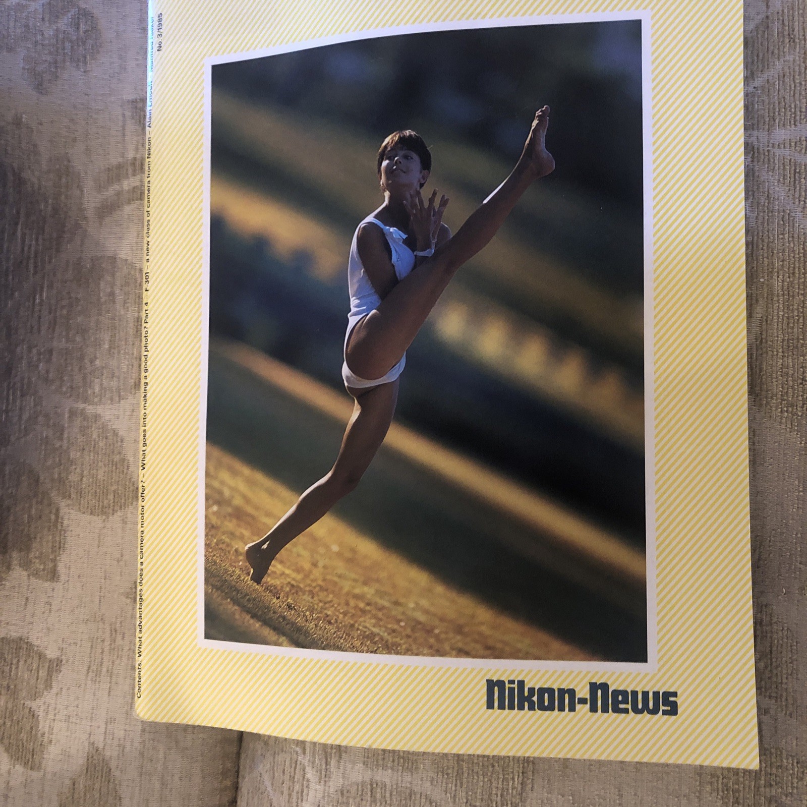2 vintage Issues Nikon News Magazines 1985 collectibles / props