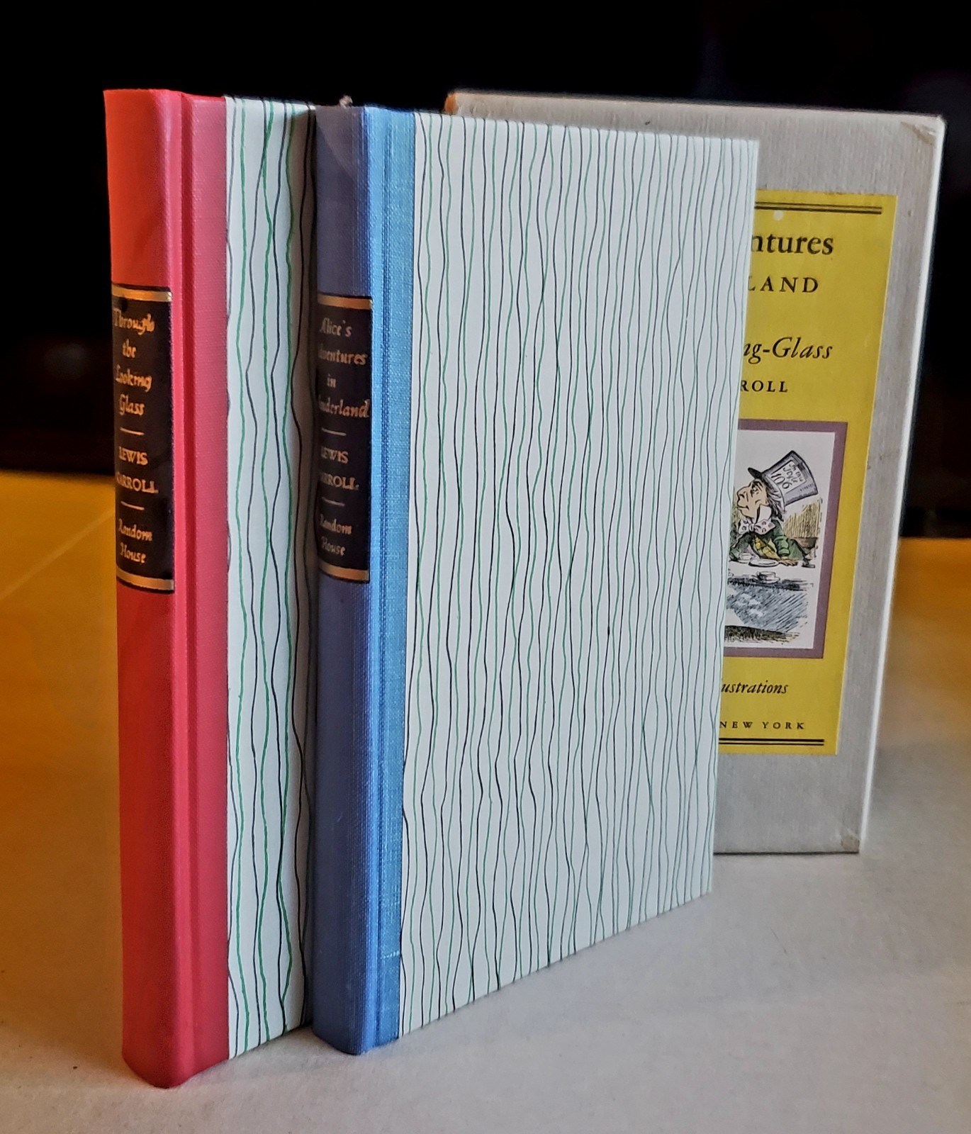 VINTAGE SET OF 2 BOOKS “ALICE’S ADVENTURES IN WONDERLAND”. CENTENNIAL EDIT. NEW.