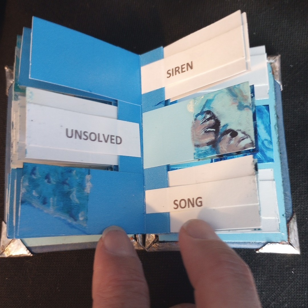 Handmade Artist Book Mini Mermaid Flag Book w embossed leather cover 3.75 x 2.5″