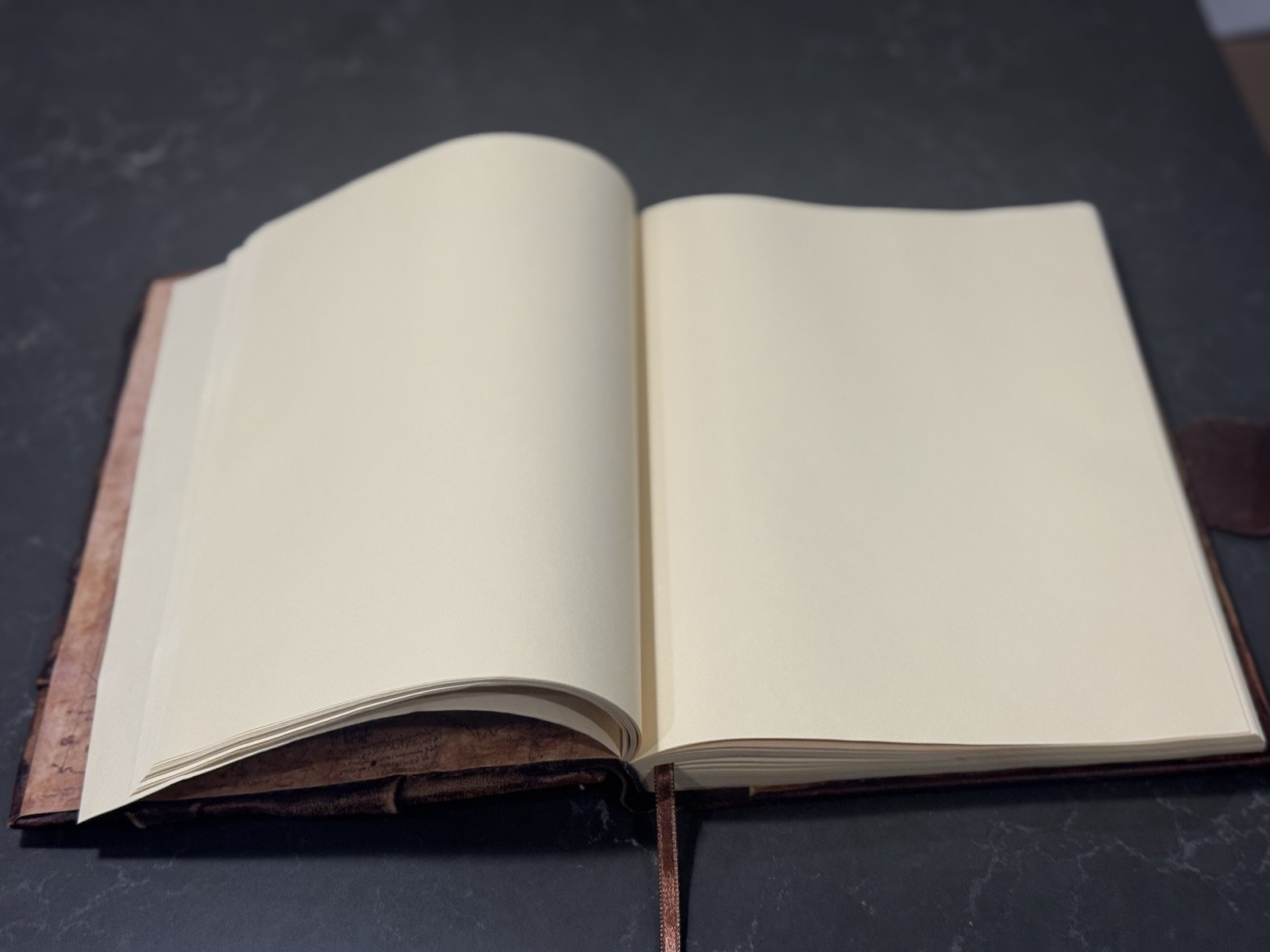 Leather Bound Journal, Embossed w/Face, Hand Sown, Metal Clasp, 9”x6.75”x1.25”