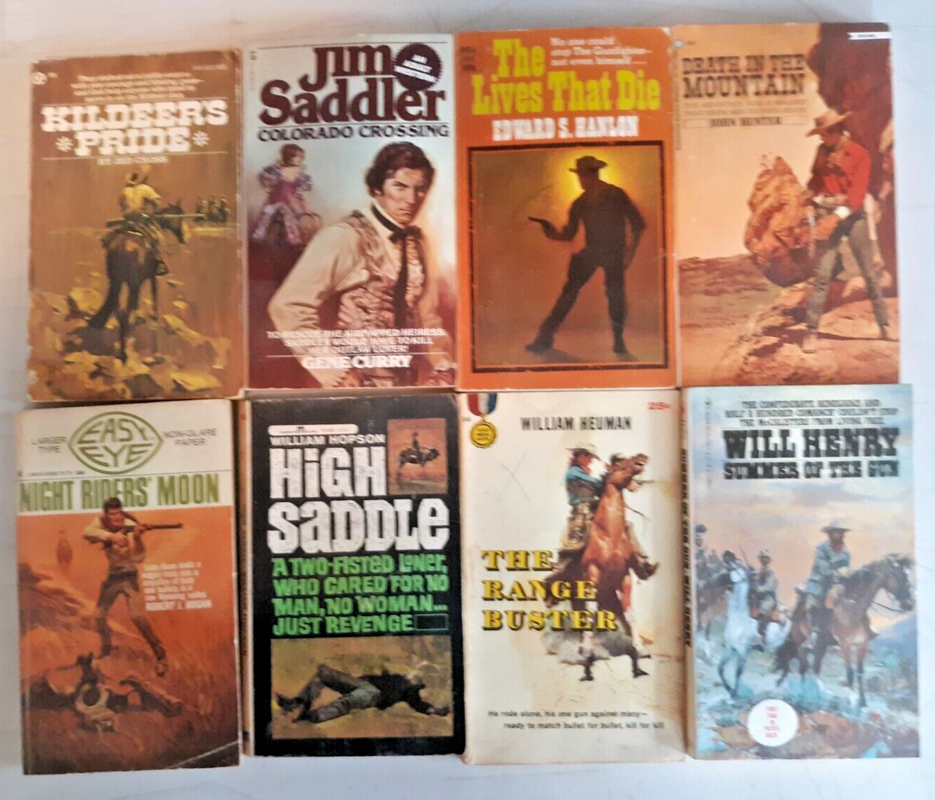 8 western paperbacks various authors Will Henry John Hunter Gene Curry more