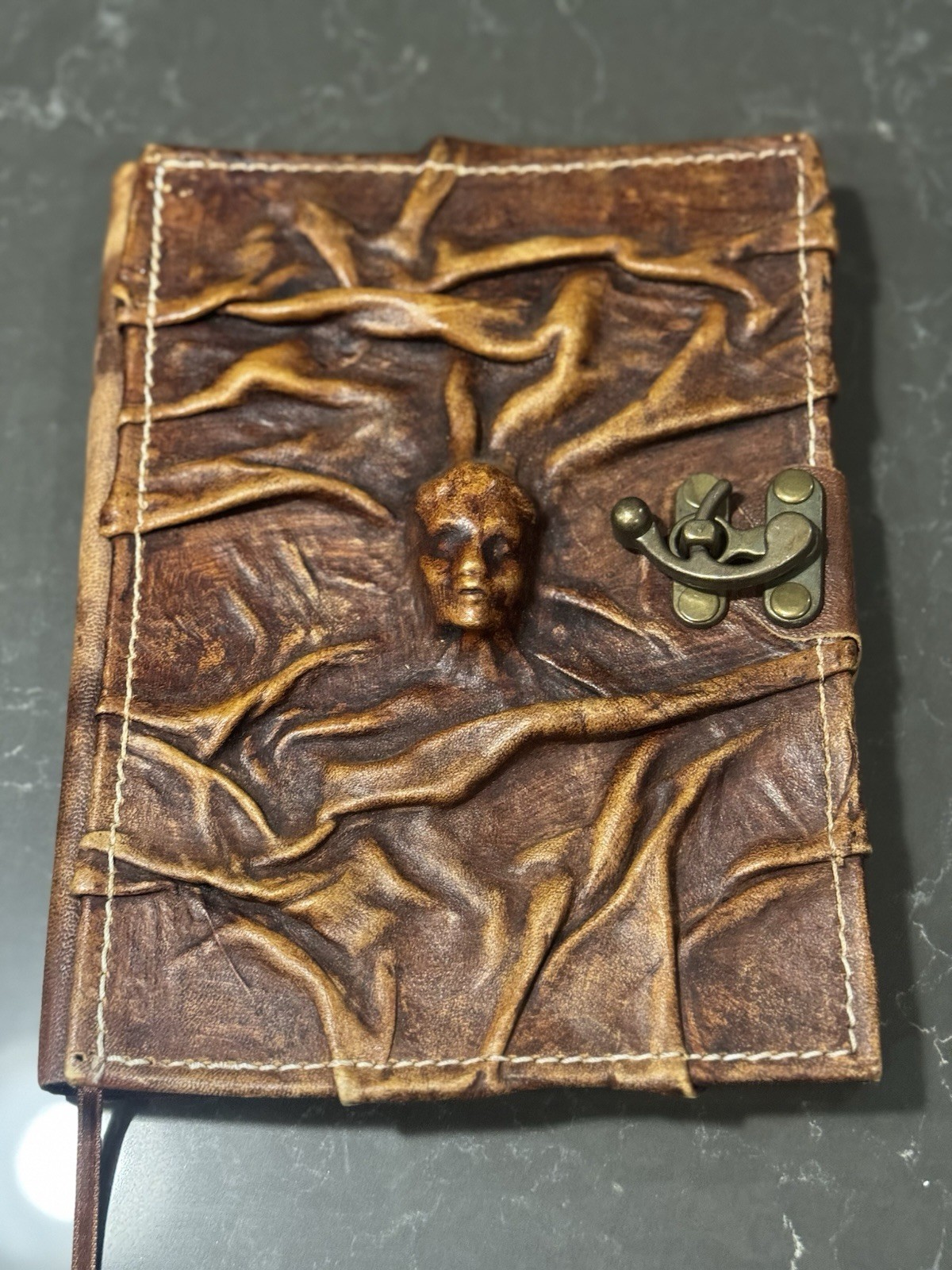Leather Bound Journal, Embossed w/Face, Hand Sown, Metal Clasp, 9”x6.75”x1.25”