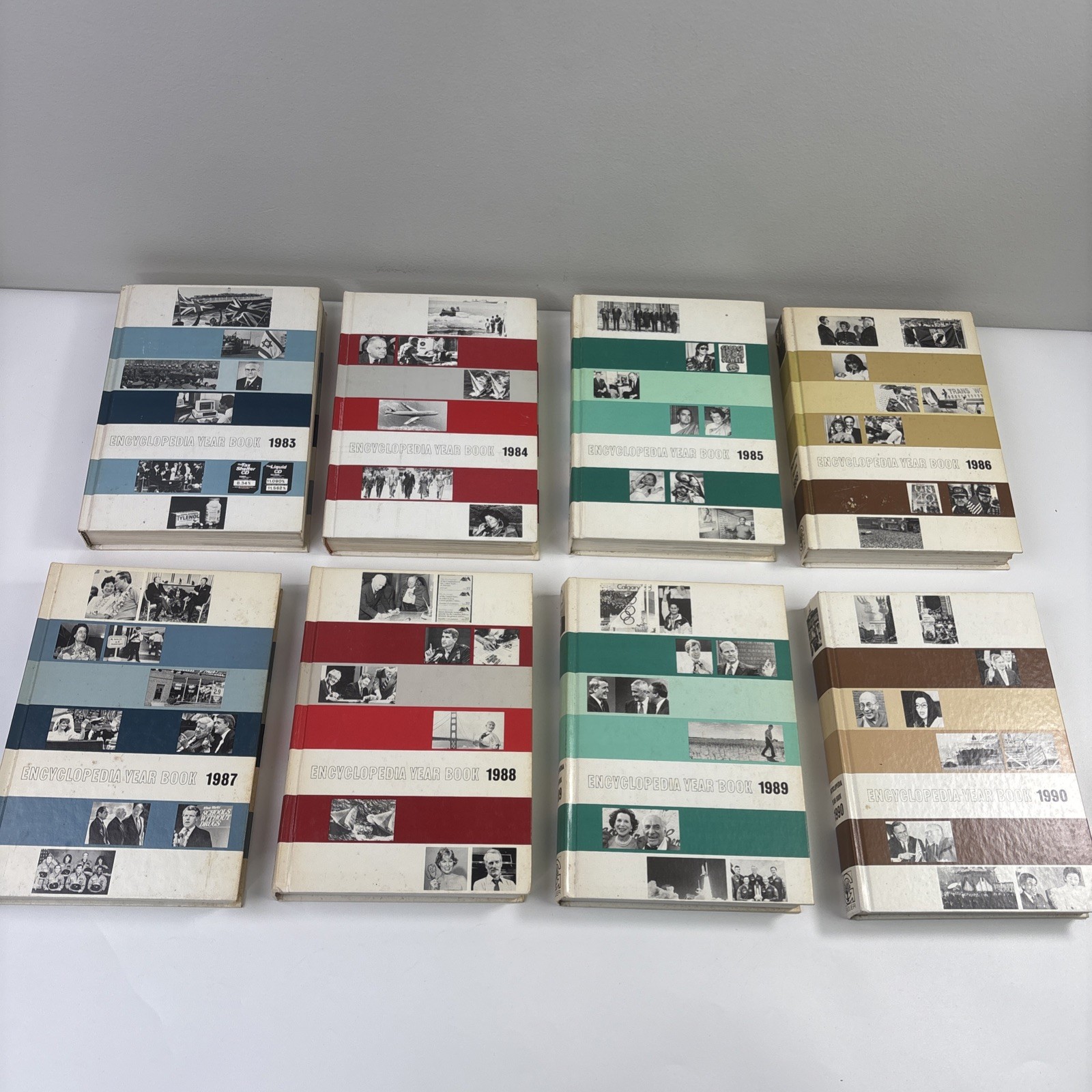 Encyclopedia Year Books by Grolier Hardcover Books Pictures 1977-1990 Lot of 14