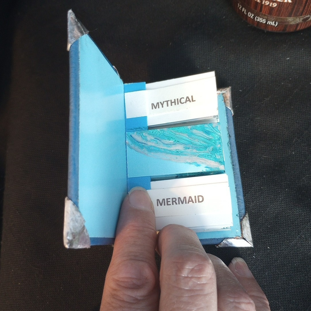 Handmade Artist Book Mini Mermaid Flag Book w embossed leather cover 3.75 x 2.5″