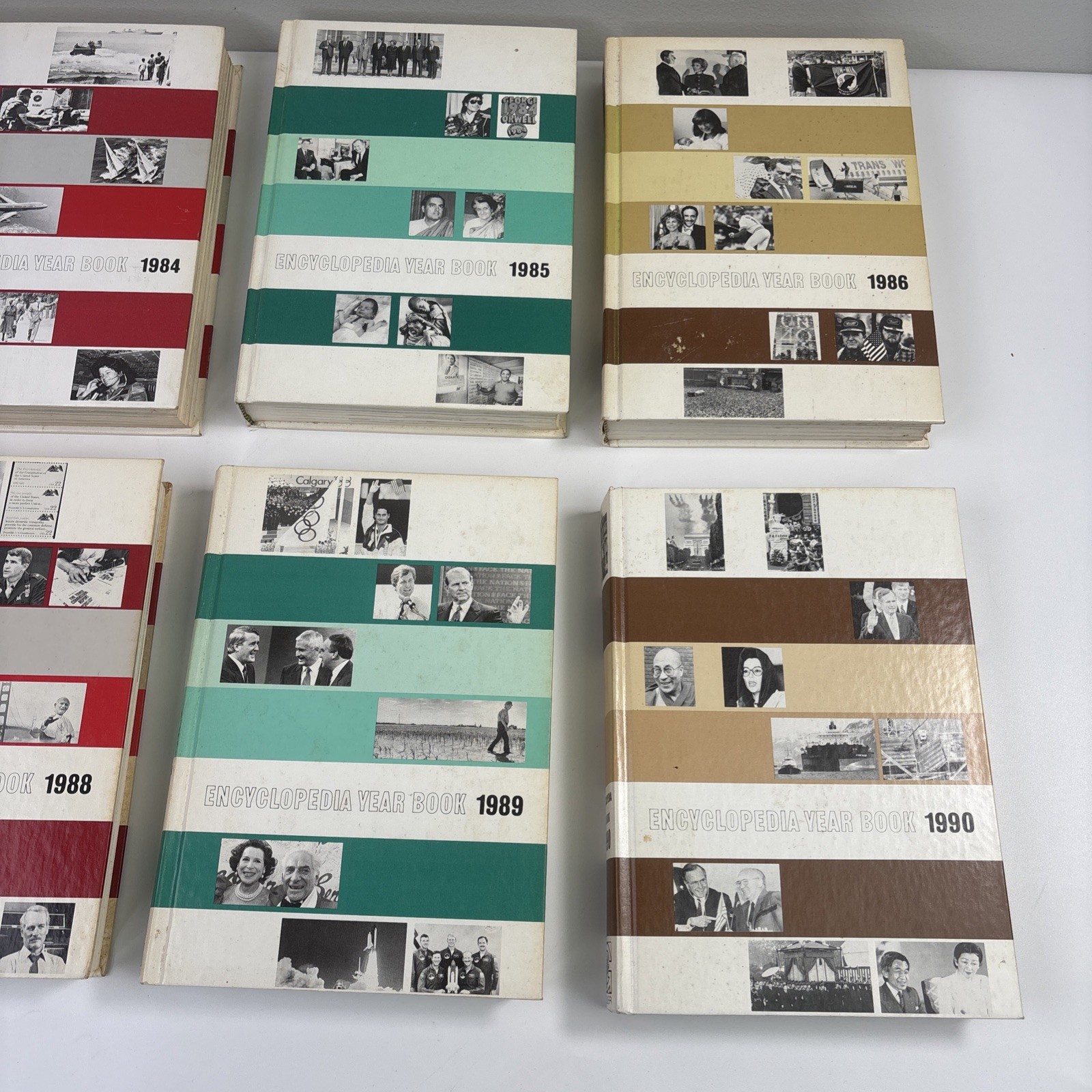 Encyclopedia Year Books by Grolier Hardcover Books Pictures 1977-1990 Lot of 14