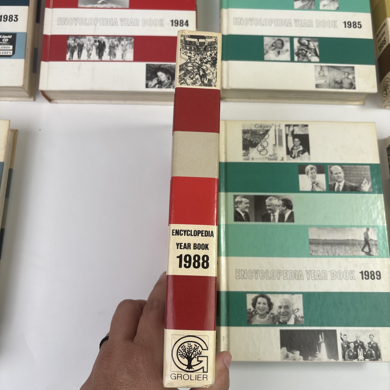 Encyclopedia Year Books by Grolier Hardcover Books Pictures 1977-1990 Lot of 14