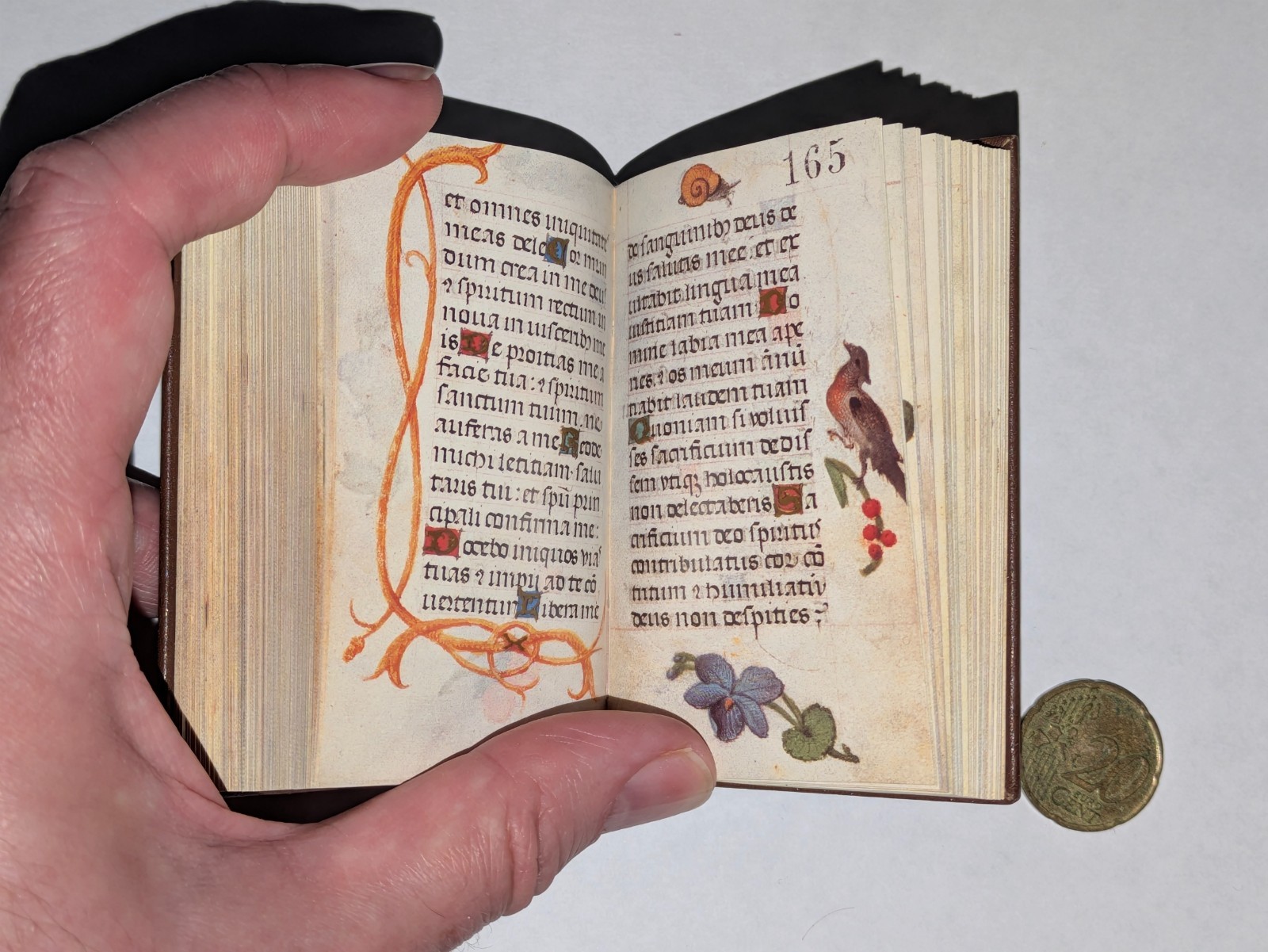 AN ILLUMINATED, MINIATURE FLEMISH BOOK OF HOURS. FACSIMILE EDITION.