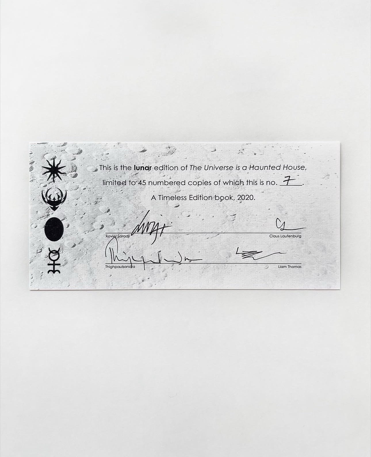 The Universe is a Haunted House Lunar Edition with Prints. Coil